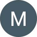 M B